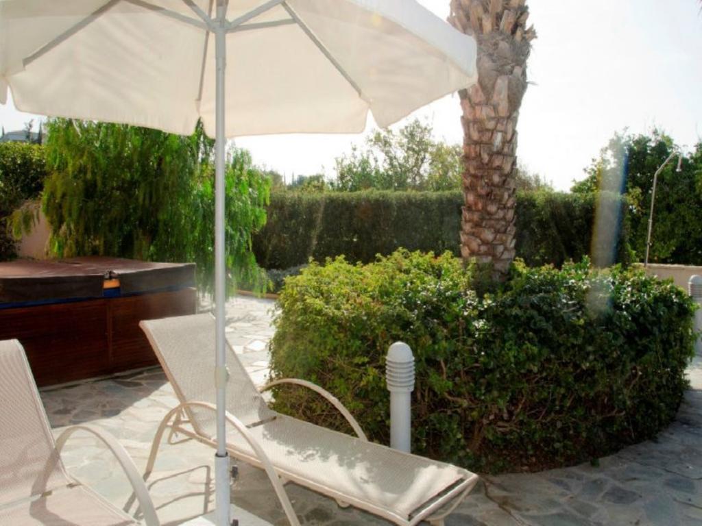 Villa Saraliana Sandy Beach Villas - Heated Pool - Jacuzzi - Private Beach Area Polis Zimmer foto